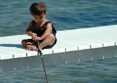 Boy Fishing on Dock